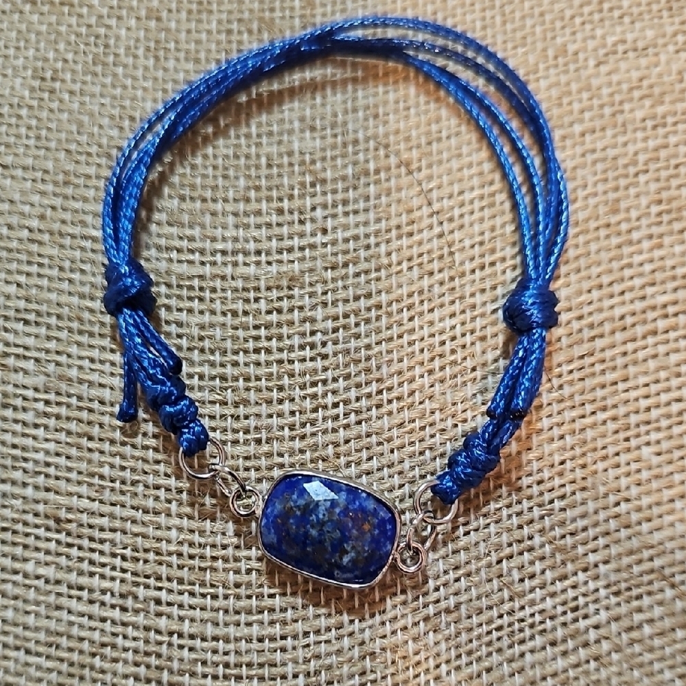 Blue Lapis Lazuli Stone Bracelet with Silver Accents.